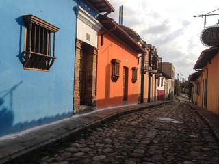 Cobblestone street with colorful houses, Bogotá