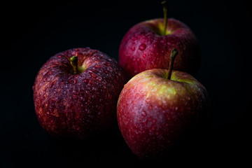 three red apples isolated