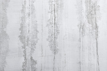 stucco concrete wall with stains from water