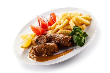 Wrapped pork chop with french fries