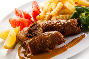 Wrapped pork chop with french fries