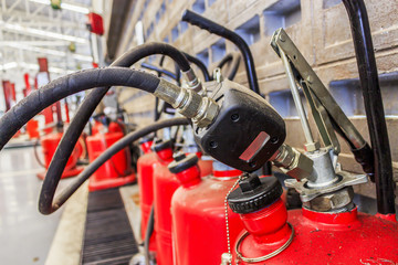 Air tank for tire car with soft-focus in the background. over light