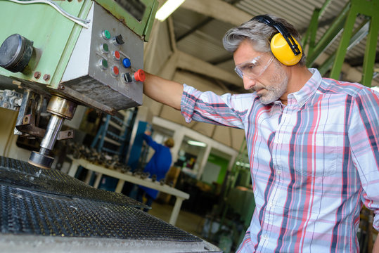 machine tender in the factory