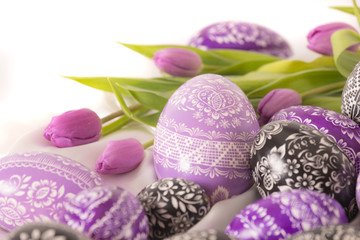 purple and black eastern eggs with purple tulip