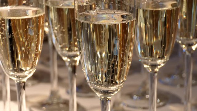 Close up of bubbling champagne glasses,selective focus