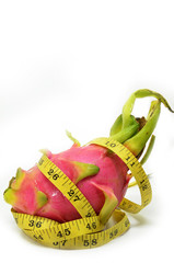 Dragon fruit and measure tape