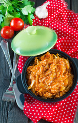 fried cabbage in bowl and on a table