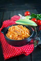 fried cabbage in bowl and on a table