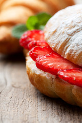 croissant with fresh strawberries