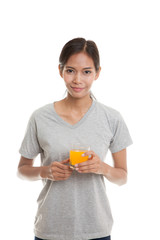 Young Asian woman drink orange juice.