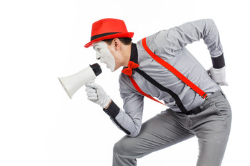 Clown, MIME, holding a Megaphone. The expression of emotions. On a white background.