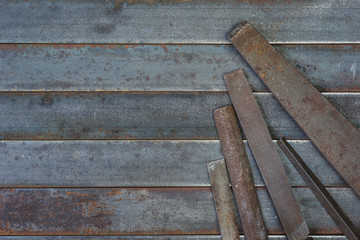 Set of various equipment, rasps, files with copy space. Carpenter tool old rusty metal background.