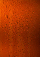 Brown glass beer bottle close up with dew drops