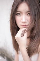 Naklejka premium Portrait of thai china adult beautiful girl relax and smile