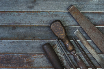 Set of various equipment, rasps for use in the hand with copy space, carpenter tool old rusty metal...
