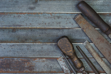 Set of various equipment, rasps for use in the hand with copy space, carpenter tool old rusty metal...