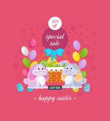 Two lovely festive rabbits, near the basket with Easter eggs.