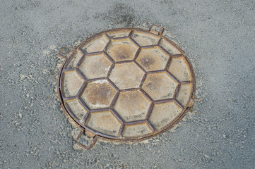 street manhole in the pavement
