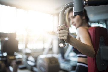 Close up woman's hand fitness in the gym.