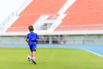Fototapeta premium Boy play football