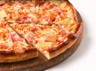 piece of pizza with ham and pineapple isolated