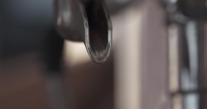 preparing espresso with professional coffee machine closeup shot, 4k prores footage