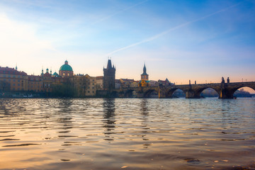 Fototapeta na wymiar Cityscape view of famous Charles bridge and Vltava river, Prague