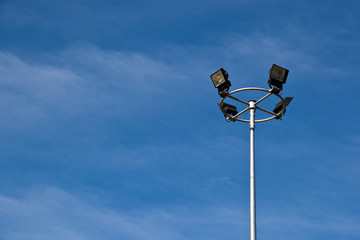 sport light post on beautiful sky background