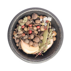 Group of Dry Spices with Thyme and Black Pepper in Black Bowl
