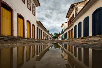 Fototapeta na wymiar Colonial Portuguese Style Houses of Historical Paraty Center Reflected in Water