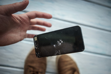 the smartphone falls between footwear