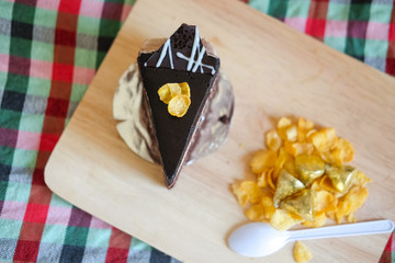 Fototapeta na wymiar Sweet brownie chocolate cream cake