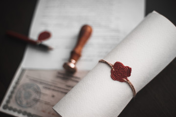 Notary's public pen and stamp on testament and last will. Notary public tools