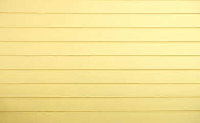 Colorful wooden boards painted in yellow