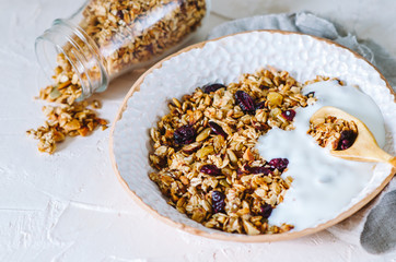 Healthy breakfast with granola and yoghurt.
