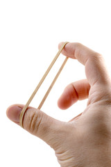 Male hand stretching rubber band