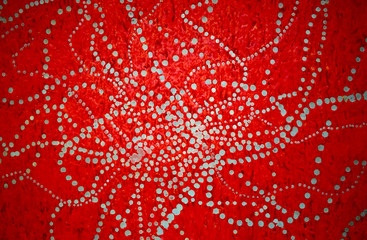 Web, red pattern. Wax drops.