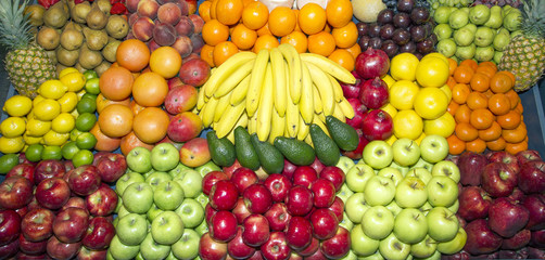 Wide angle photo of organic fruits on retail market