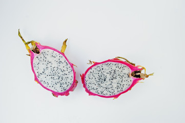 Exotic fruit pitaya or pitahaya, dragon fruit (Hylocereus undatus) isolated on white background....