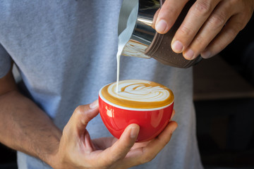 Coffee latte art by Barista