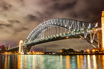 Sydney Harbour night time Panorama with bridge  in North Sydney