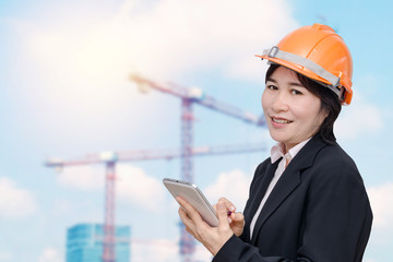 Senior asian engineer woman at construction site