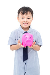 Fototapeta na wymiar Young asian boy holding piggy bank over white background