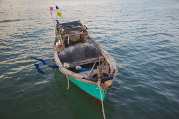 Obraz premium Colorful wooden fishing boat in Phu Quoc island sea, Kien Giang province, Vietnam