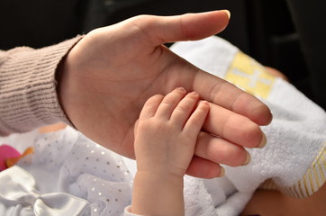 Closeup of baby hand