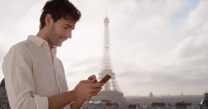 Travel man using digital tablet technology view from hotel terrace breakfast vacation