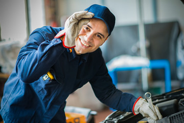 Mechanic working in his workshop