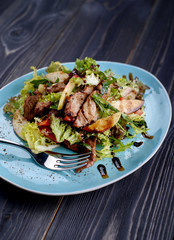 Veal medallions with apple, pear and cheese