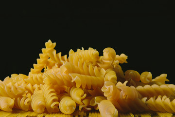 Closeup of pasta on black background