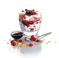 Glass of delicious dessert on white background